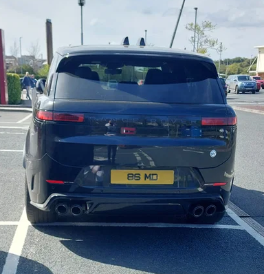 UK Number Plate 86 MD on a 2024 Black Land Rover