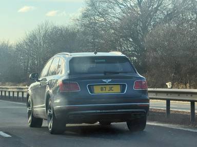 UK Number Plate 87 JC on a 2017 Black Bentley Bentayga