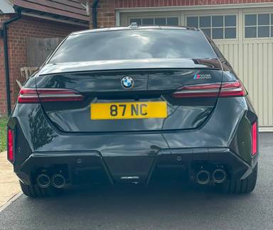 UK Number Plate 87 NC on a 2025 Black BMW M5 Phev Auto