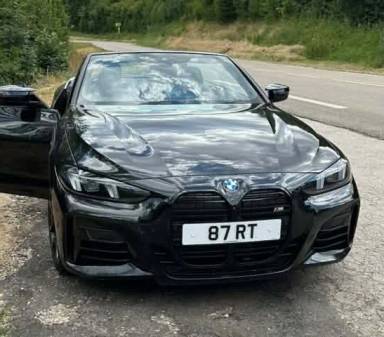 UK Number Plate 87 RT on a 2025 Black BMW M440i Xdrive Mhev Auto