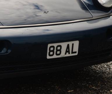 UK Number Plate 88 AL on a 1991 Green Porsche 911
