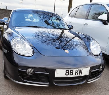UK Number Plate 88 KN on a 2006 Black Porsche Cayman