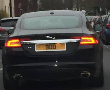 UK Number Plate 9 OO on a 2010 Black Jaguar XF