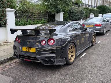 UK Number Plate 9 UP on a 2011 Black Nissan Gt-R