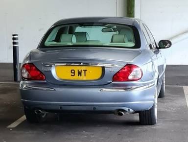 UK Number Plate 9 WT on a 2007 Blue Jaguar XJ