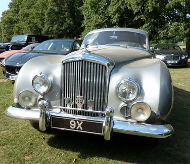 UK Number Plate 9 X on a 1954 Grey Bentley