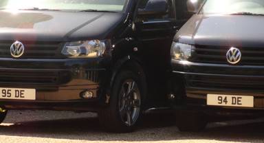 UK Number Plate 94 DE on a 2013 Black Volkswagen Transporter