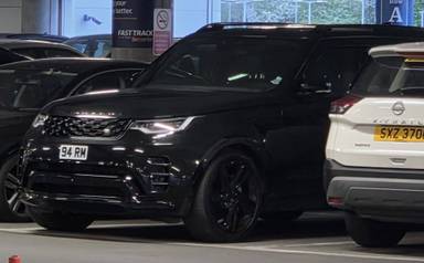 UK Number Plate 94 RM on a 2024 Black Land Rover Discovery Dynamic Hse D Mhev A