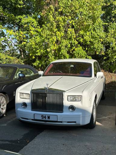 UK Number Plate 94 W on a 2009 White Rolls Royce Phantom