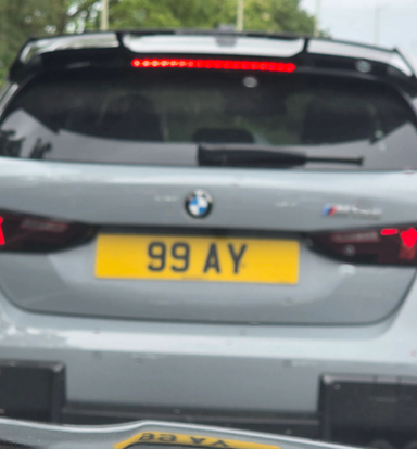 UK Number Plate 99 AY on a 2025 Grey BMW M135 Xdrive Auto