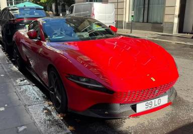 UK Number Plate 99 LO on a 2021 RED Ferrari Roma S-A