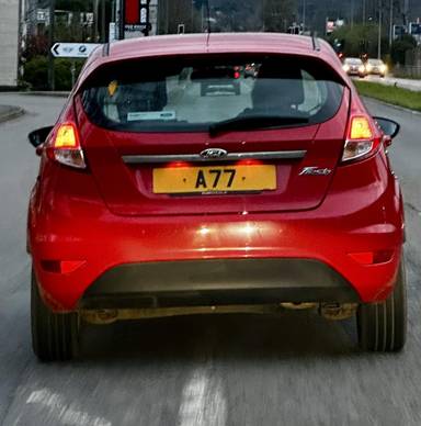 UK Number Plate A 77 on a 2014 RED Ford Fiesta