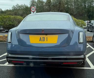 UK Number Plate AB 1 on a 2024 Blue Rolls Royce Spectre Ev