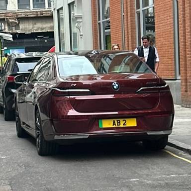 UK Number Plate AB 2 on a 2023 RED BMW I7 Xdrive60 Excellence