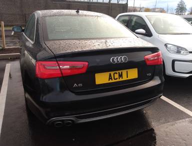 UK Number Plate ACM 1 on a 2012 Black Audi A6 S Line Tdi Cvt