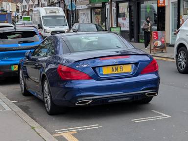 UK Number Plate AM 9 on a 2019 Blue Mercedes-Benz SL