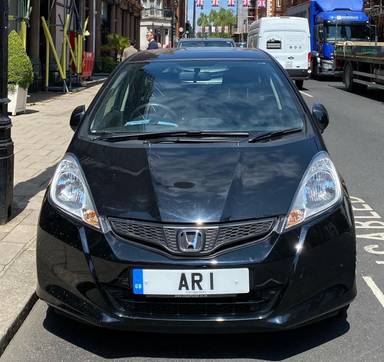UK Number Plate AR 1 on a 2015 Black Honda Jazz