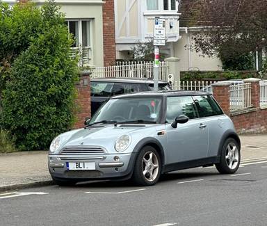 UK Number Plate BL 1 on a 2002 Silver Mini Cooper