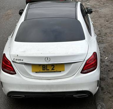 UK Number Plate BL 2 on a 2017 White Mercedes-Benz C