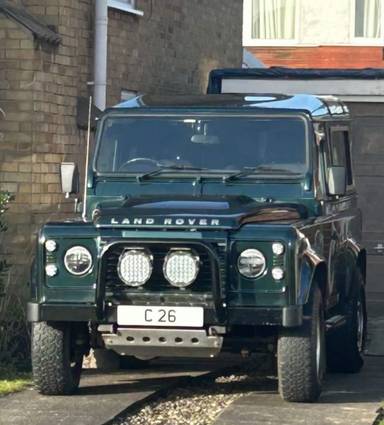 UK Number Plate C 26 on a 2012 Green Land Rover Defender