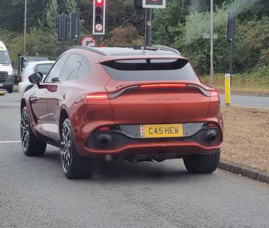 UK Number Plate C45 HEW on a 2021 Orange Aston Martin Dbx V8 Auto