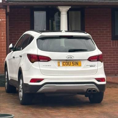 UK Number Plate COU 51N on a 2016 White Hyundai Santa Fe