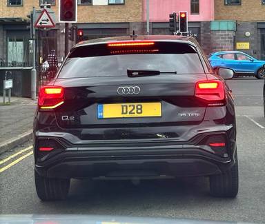 UK Number Plate D 28 on a 2023 Black Audi Q2