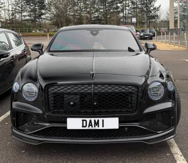 UK Number Plate DAM 1 on a 2025 Black Bentley Flying Spur Speed Hybrid Auto