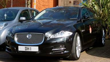 UK Number Plate DH 1 on a 2013 Black Jaguar XJ