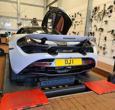 UK Number Plate DJ 1 on a 2017 White Mclaren 720s V8 S-A