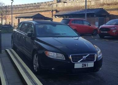 UK Number Plate DN 1 on a 2010 Black Volvo S80