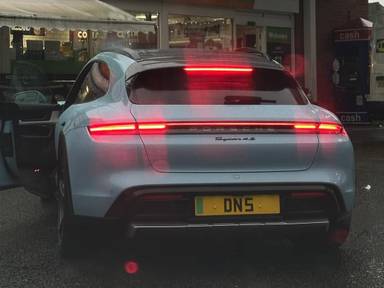 UK Number Plate DN 5 on a 2022 Blue Porsche Taycan 4s Cross Turismo