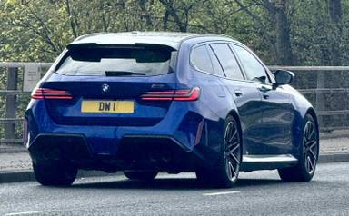 UK Number Plate DW 1 on a 2026 Blue BMW M5 Phev Auto