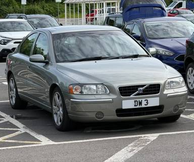 UK Number Plate DW 3 on a 2005 Green Volvo S60