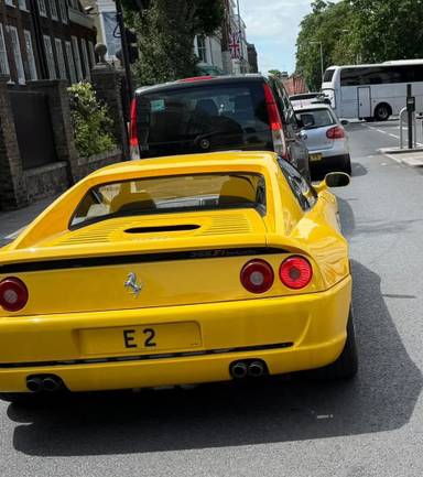 UK Number Plate E 2 on a 1998 Yellow Ferrari