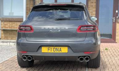 UK Number Plate F1 ONA on a 2018 Grey Porsche Macan