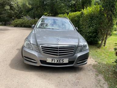 UK Number Plate F1 XES on a 2010 Silver Mercedes-Benz E