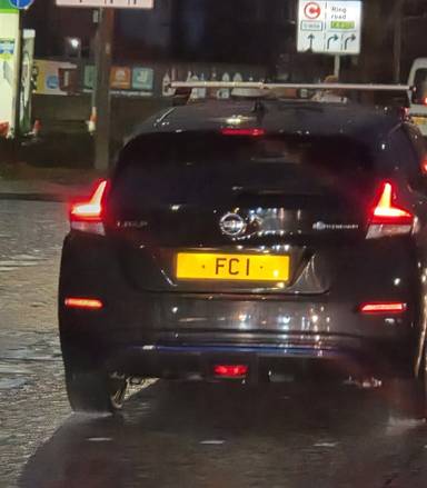 UK Number Plate FC 1 on a 2021 Black Nissan Leaf
