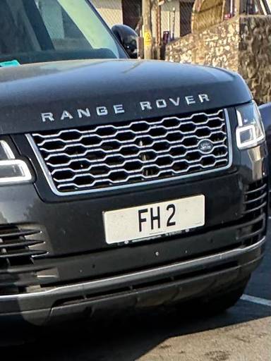 UK Number Plate FH 2 on a 2019 Grey Land Rover Range Rover