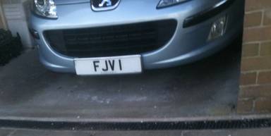 UK Number Plate FJV 1 on a 2005 Silver Peugeot 407