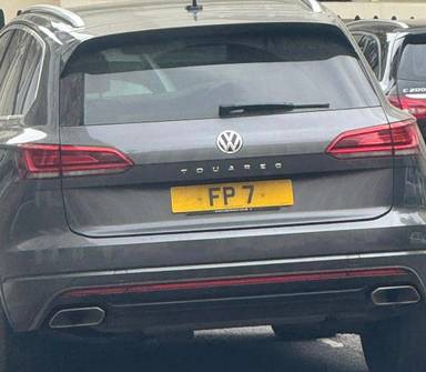 UK Number Plate FP 7 on a 2019 Grey Volkswagen Touareg