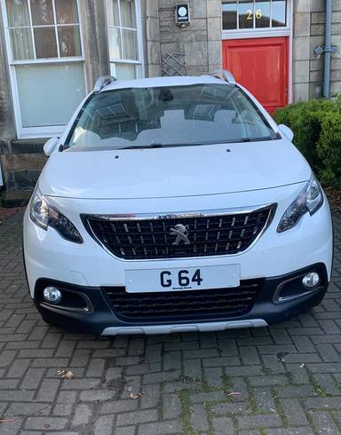 UK Number Plate G 64 on a 2018 White Peugeot 2008