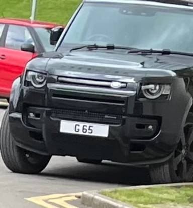 UK Number Plate G 65 on a 2022 Black Land Rover Defender X-Dynamic Hse Mhev A