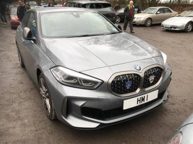 UK Number Plate HM 1 on a 2024 Grey BMW M135 Xdrive Auto