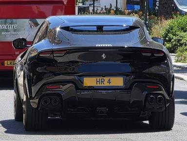 UK Number Plate HR 4 on a 2025 Black Ferrari Purosangue S-A