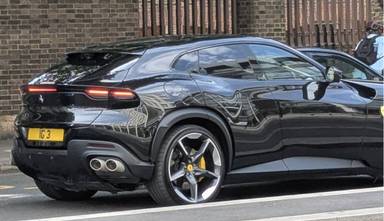 UK Number Plate IG 3 on a 2025 Black Ferrari Purosangue S-A