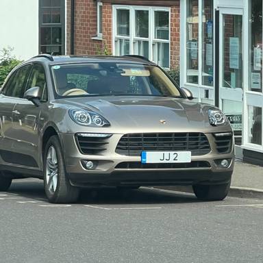 UK Number Plate JJ 2 on a 2015 Silver Porsche Macan