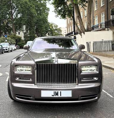 UK Number Plate JM 1 on a 2014 Grey Rolls Royce Phantom