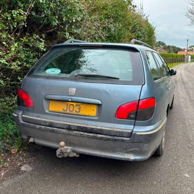 UK Number Plate JO 3 on a 1999 Blue Peugeot 406