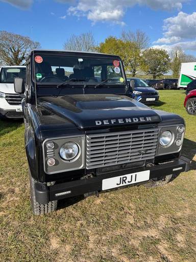 UK Number Plate JRJ 1 on a 2014 Black Land Rover Defender